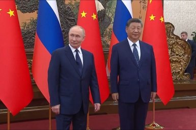 Россия и Китай не планируют "дружить против кого-либо", заявил Путин
