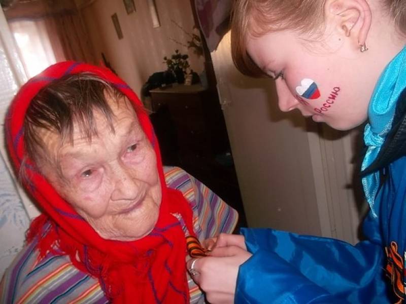Акция "Георгиевская ленточка" стартовала в Октябрьском районе ЕАО, Фото с места события из других источников